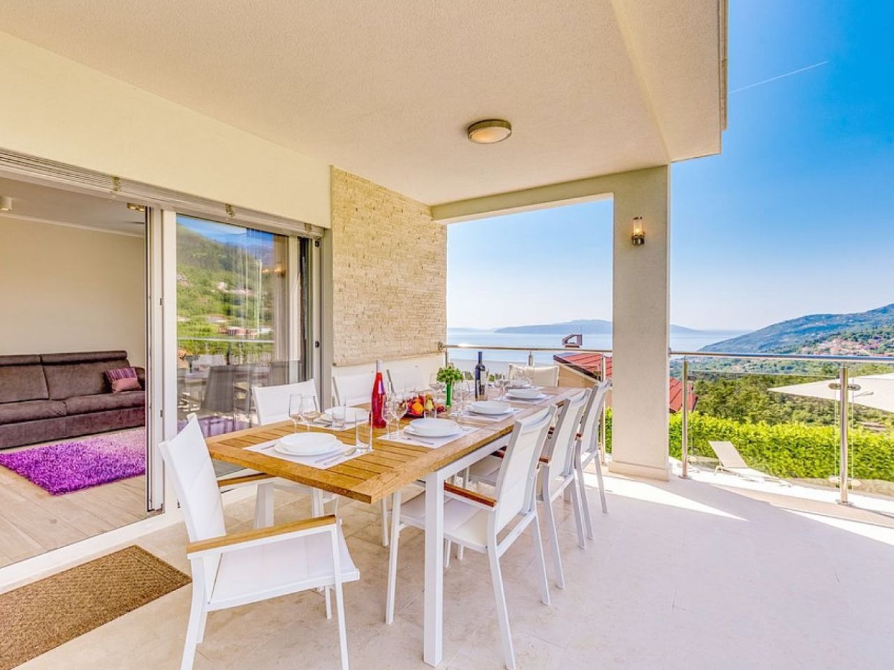 Covered outdoor dining terrace overlooking Kvarner Bay